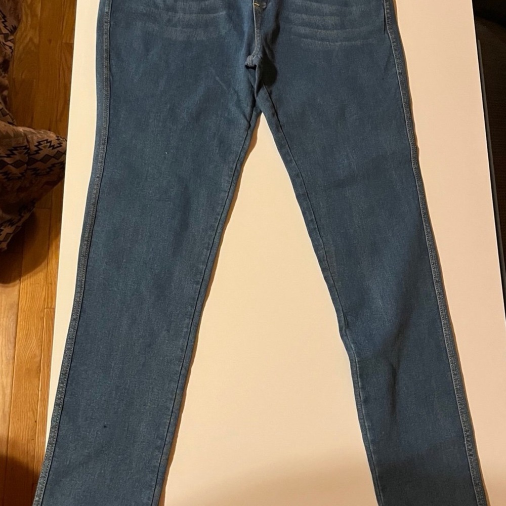 Classic Blue Skinny Jeans with Smooth Texture and Full Length Cut